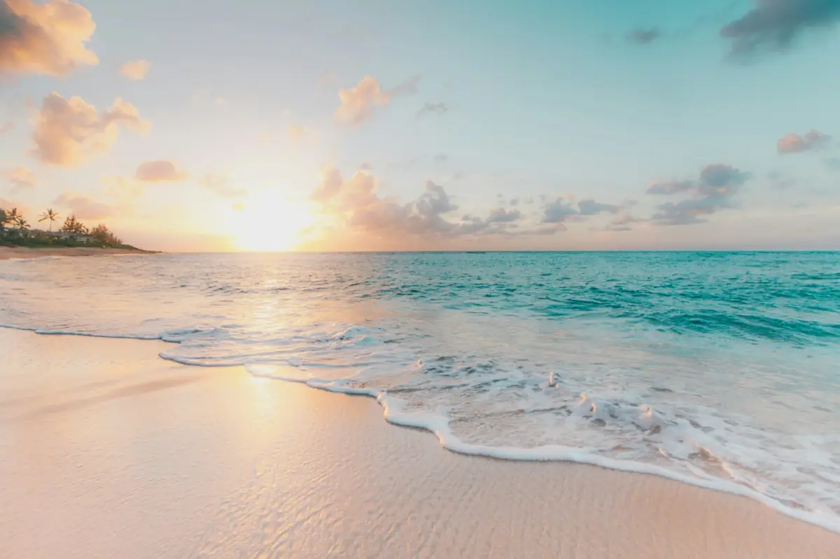 Golden-hour sunset over the ocean on Oahu's North Shore