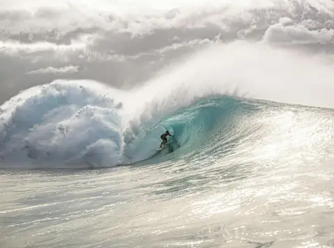 Surfer at Banzai Pipeline